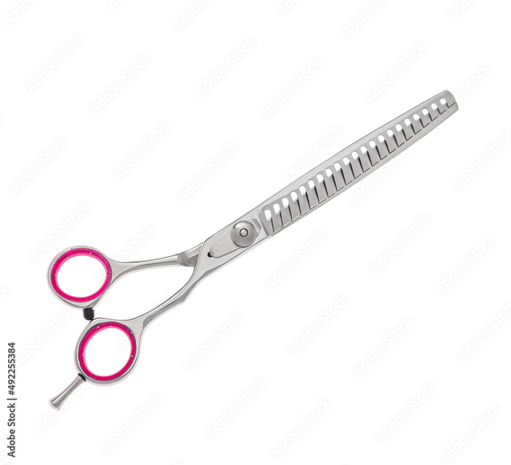 Scissors for cutting people and pets. Grooming scissors. Closed scissors on a white isolated background. Side view. Scissors for cutting people and pets. Grooming scissors. Closed scissors on a white isolated background. Side view.