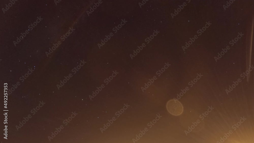 Bokeh moon light n star particles in night sky space TimeLapse