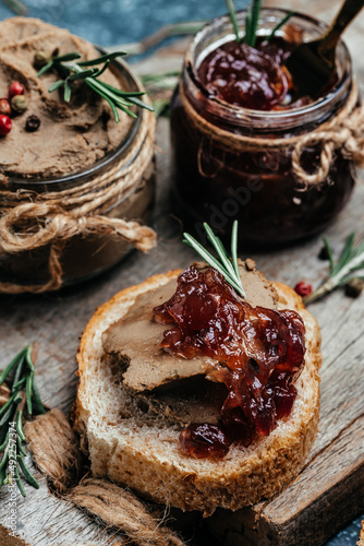Belgian duck liver pate with onion marmalade jam confiture. Fresh homemade chicken liver pate with greens. banner, menu, recipe place for text, top view