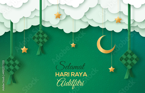 Selamat Hari Raya Aidilfitri greeting card. Vector illustration. Hanging ketupat and crescent with stars, paper cut clouds on green background. Caption: Fasting Day of Celebration