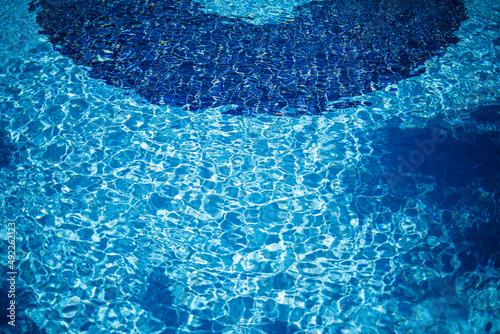 Blue deep pool with chlorinated water, outdoor swimming pool