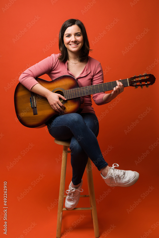 Full length of a beautiful female musician Full length of a beautiful female musician