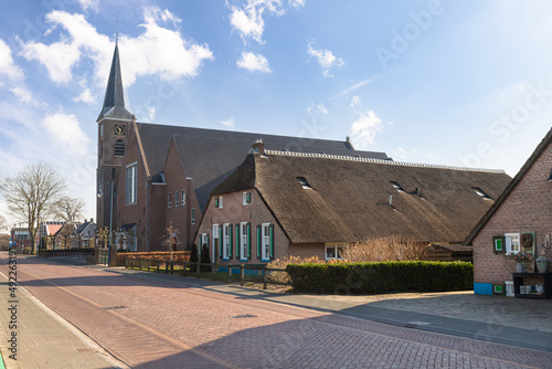 Street overlooking the village church in the center of the religious Dutch village of Staphorst. photo