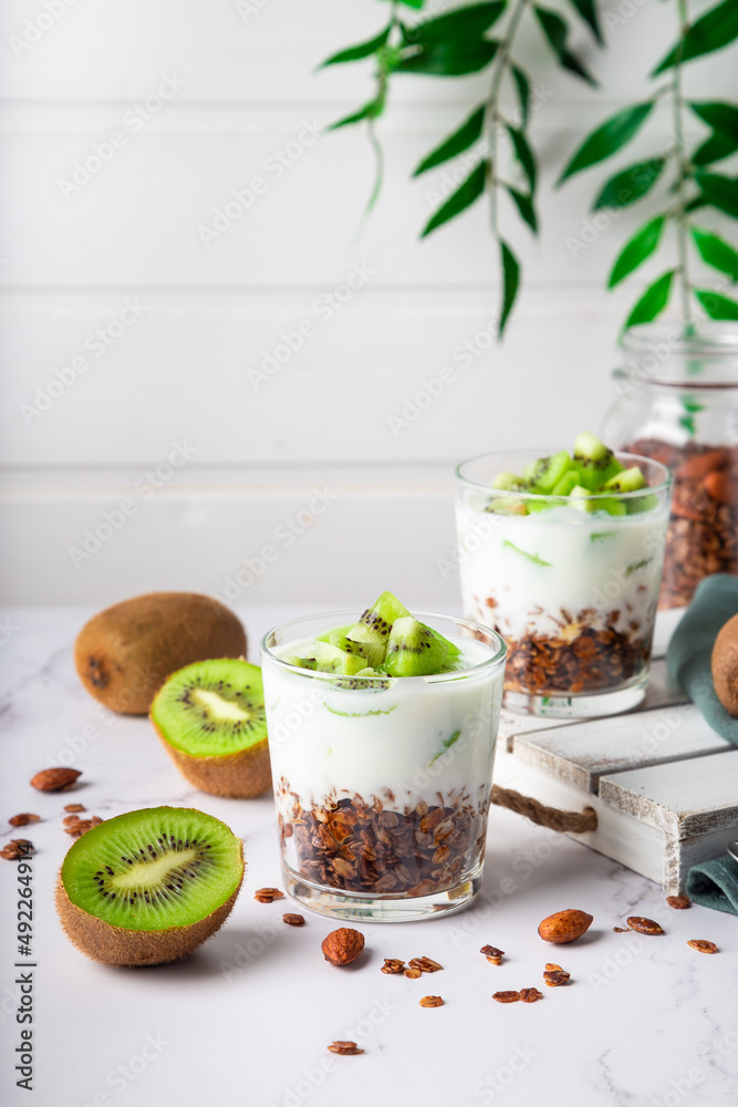 Homemade granola parfait with kiwi fruit Homemade granola parfait with kiwi fruit