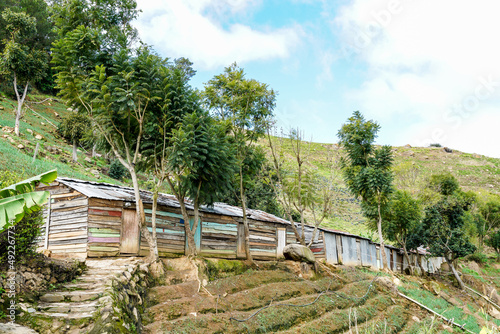 Fotografie Dramatic image of a housing project for haitian field workers in the Caribbean mountains of the Dominican Republic