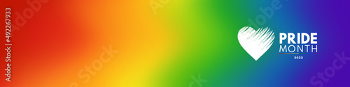 Pride gradient background with 2022 LGBTQ Pride flag colours. Vector banner logo lgbtq 2022 pride month with rainbow heart. Symbol of pride month june support. Isolated on white background.