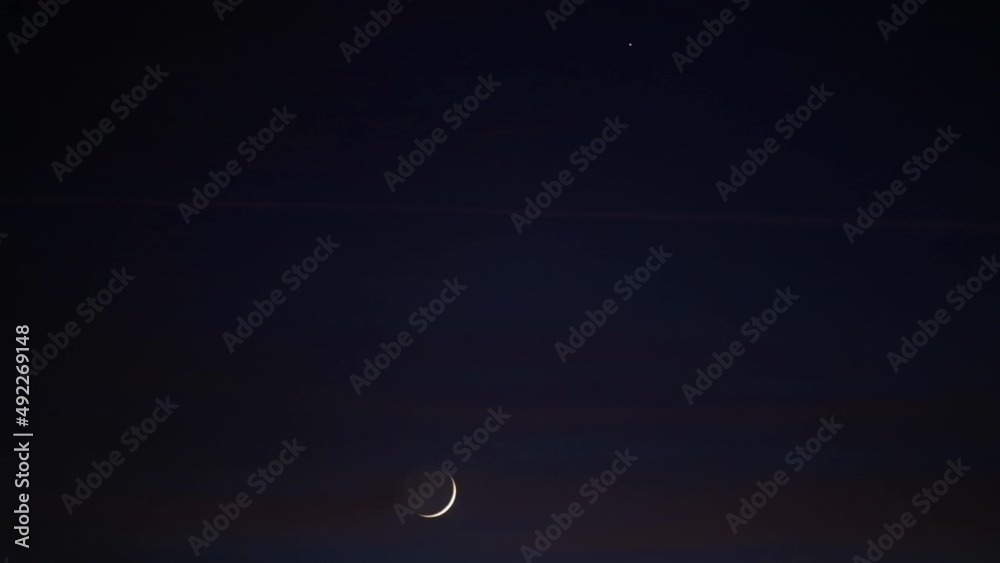 Crescent Moon with twinkling stars, planets on evening sky. Crescent Moon with twinkling stars, planets on evening sky.