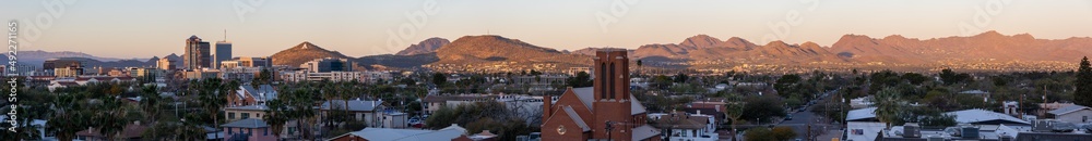 Tucson skyline at dawn with morning sun lighting the mountains