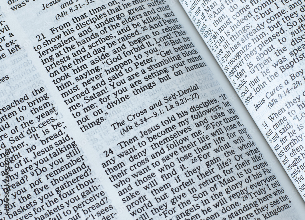The cross and self-denial gospel verses. The teaching of God Jesus Christ. The biblical concept of studying the Christian Holy Bible Book. A closeup. The cross and self-denial gospel verses. The teaching of God Jesus Christ. The biblical concept of studying the Christian Holy Bible Book. A closeup.