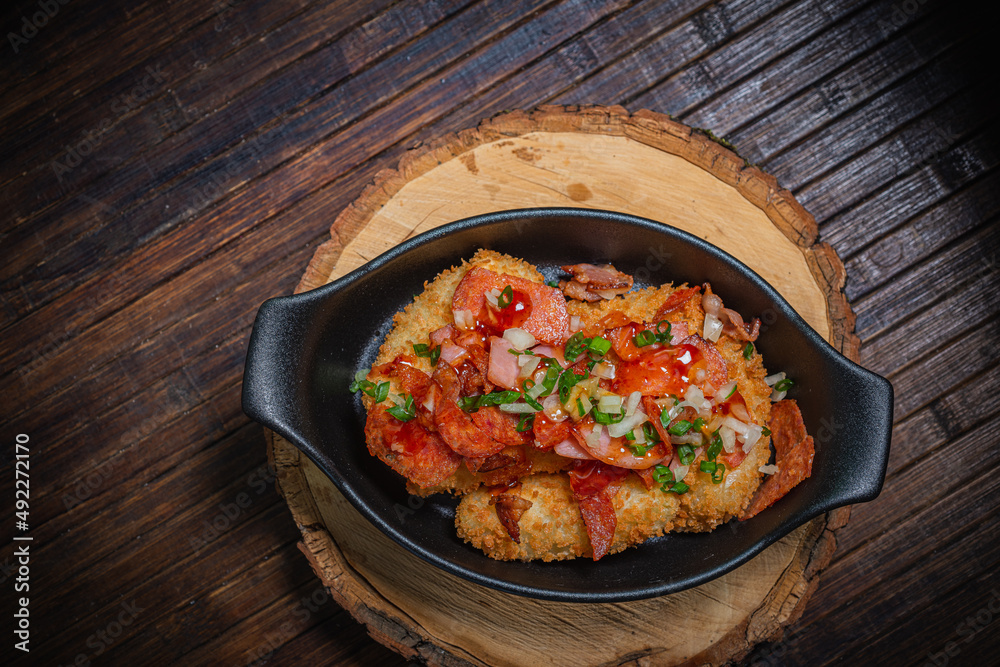 Meat stew with baked potatoes- hunter style. Fastfood- restaurant concept Meat stew with baked potatoes- hunter style. Fastfood- restaurant concept