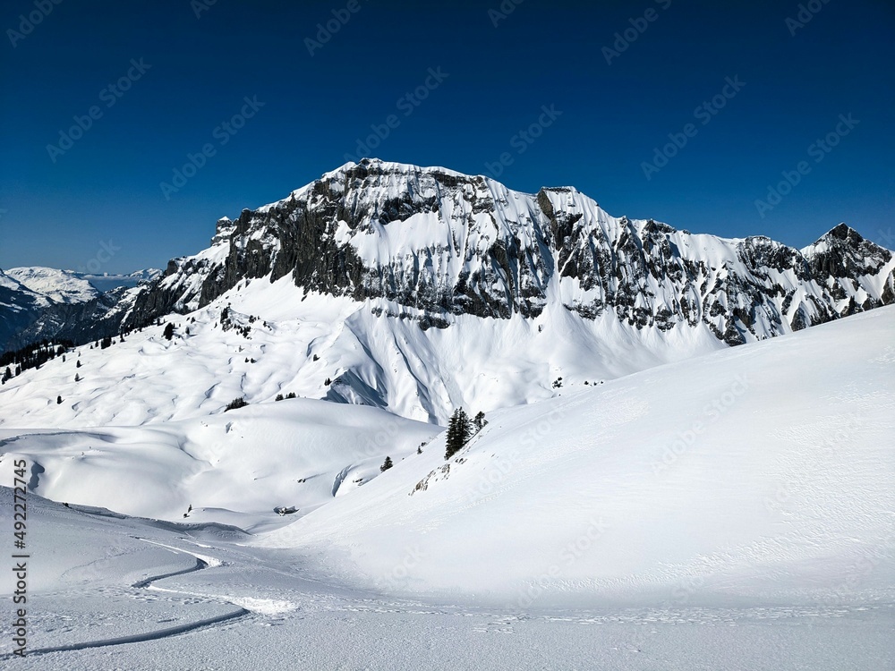 Ski tour in Switzerland. Mountaineering with ski on the mountain Silberen in the canton of Glarus Uri Switzerland.
