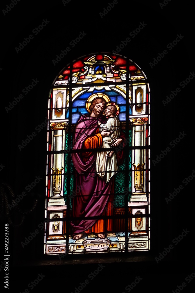 Garachico, Tenerife, Canary Islands, Spain, February 23, 2022: Stained glass window with the image of Saint Joseph in the Church of Santa Ana. Garachico, Tenerife, Spain