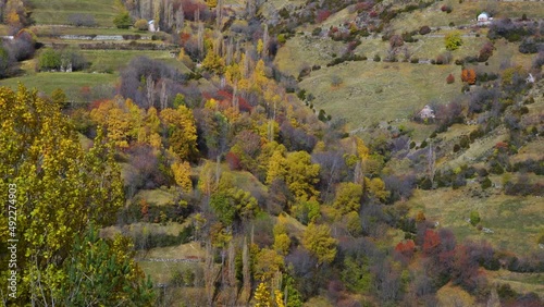 Panoramic view from Cruz de Puyadase. Autumn landscape in the Valley of Plan in the surroundings of the Cinqueta River. Huesca, Aragon, Spain, Europe photo