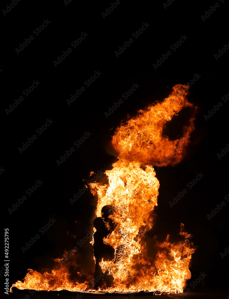 Full fire body burn. One of the most dangerous stunts that professionals do for television or movies.  The stunt person wears several layers of protective clothing, including fire-resistant materials.