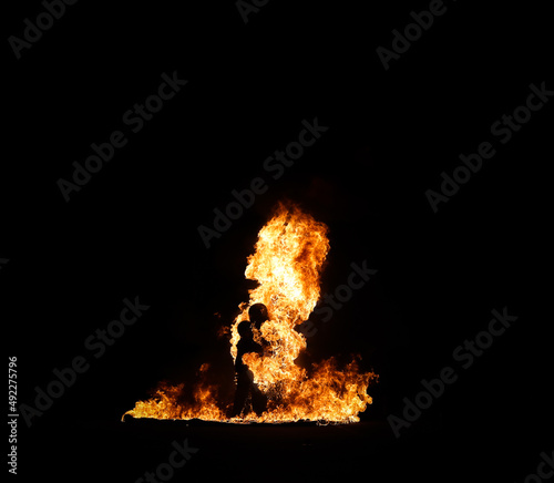 Full fire body burn. One of the most dangerous stunts that professionals do for television or movies.  The stunt person wears several layers of protective clothing, including fire-resistant materials.