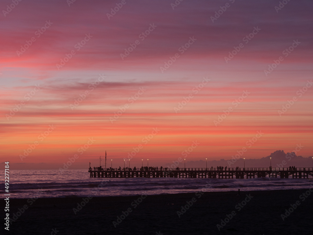 Forte dei Marmi: pier  ,beach  ocean in a wonderful  sunset