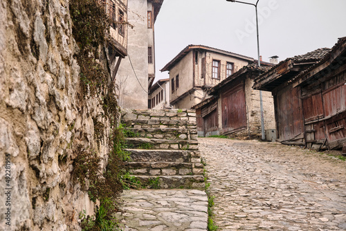 Safranbolu houses at winter, cobblestone way and ancient ottoman style houses at Safranbolu photo