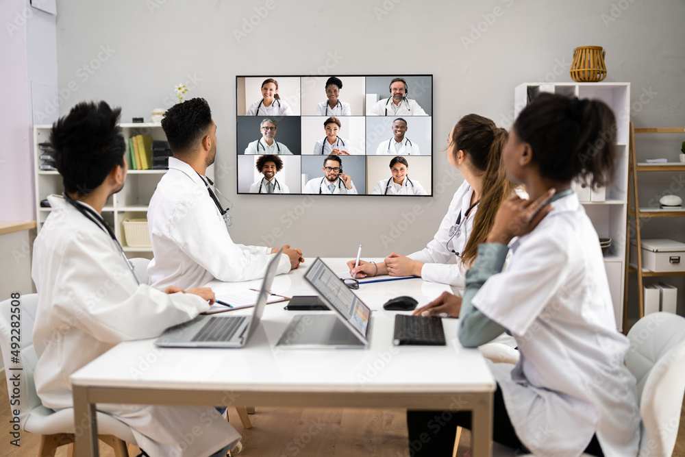 Doctor In Online Medical Video Conference With Diverse Team Doctor In Online Medical Video Conference With Diverse Team