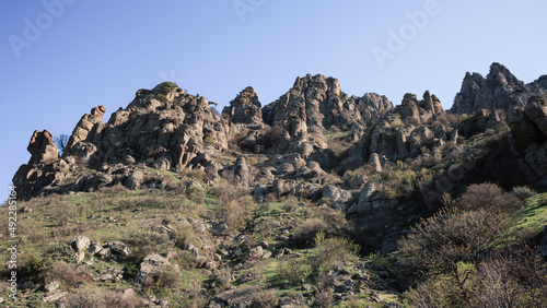 Mountains, black sea and mountains in the distance, sunny day, summer, blue sky, Crimea, Mount Demerdzhi, mount rushmore national park photo