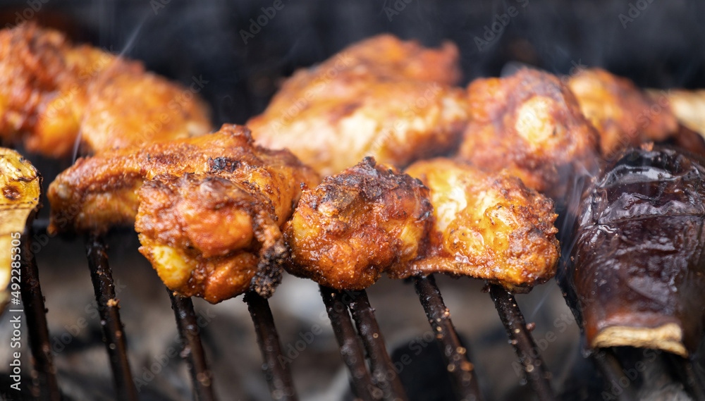 Grilled fresh meat. Close-up of a hot grill with meat.