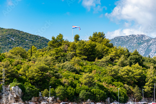 Croatian flag waving on the hill photo