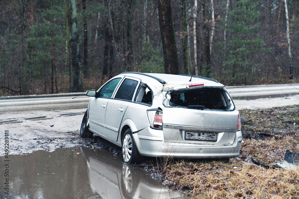 Disastrous family suv at countryside Poland woods . High quality photo