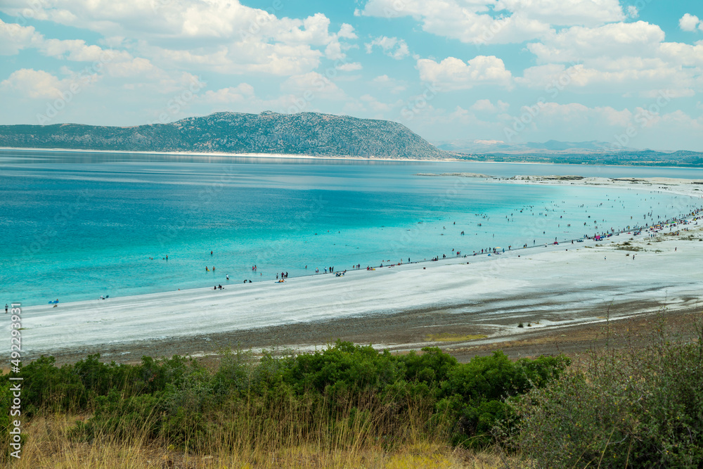 Turquoise lake Salda Turkey. White mineral rich beach. Salda lake with white sand and green water. Burdur Turkey
