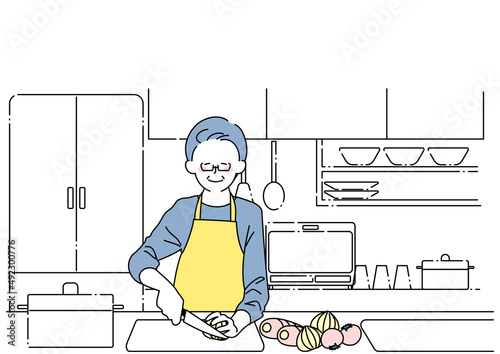 料理をするシニア男性