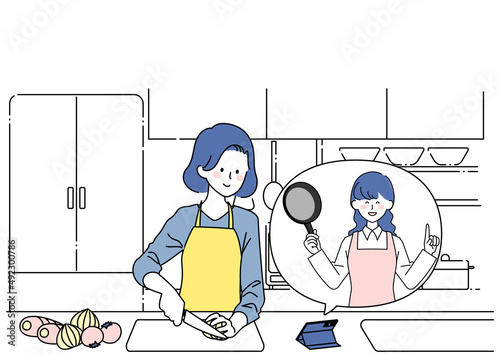スマホで動画を観ながら料理をする女性