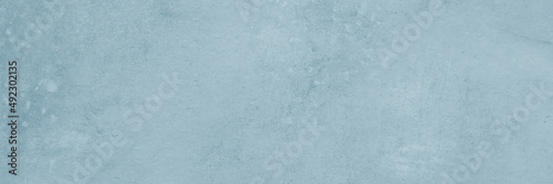 Blue concrete stone surface paint wall background, Grunge cement paint texture backdrop, Blue rough concrete stone wall background, Copy space for interior design background, banner, wallpaper