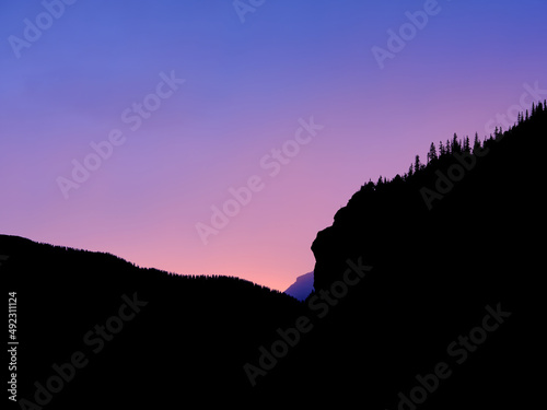 purple and pink Sunset glow in a valley in the San Juan Mountains Colorado