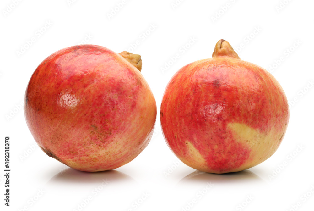 Ripe pomegranate fruit isolated on white background Ripe pomegranate fruit isolated on white background