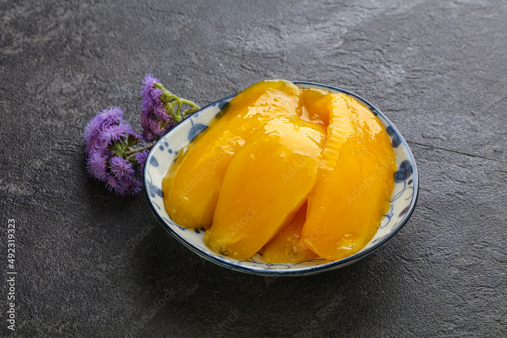 Sweet canned tropical fruit mango