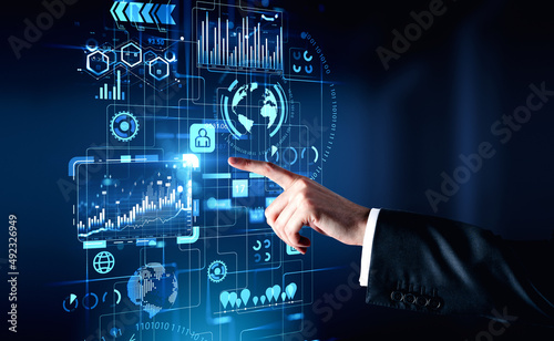 Businessman wearing formal suit is touching digital interface with forex