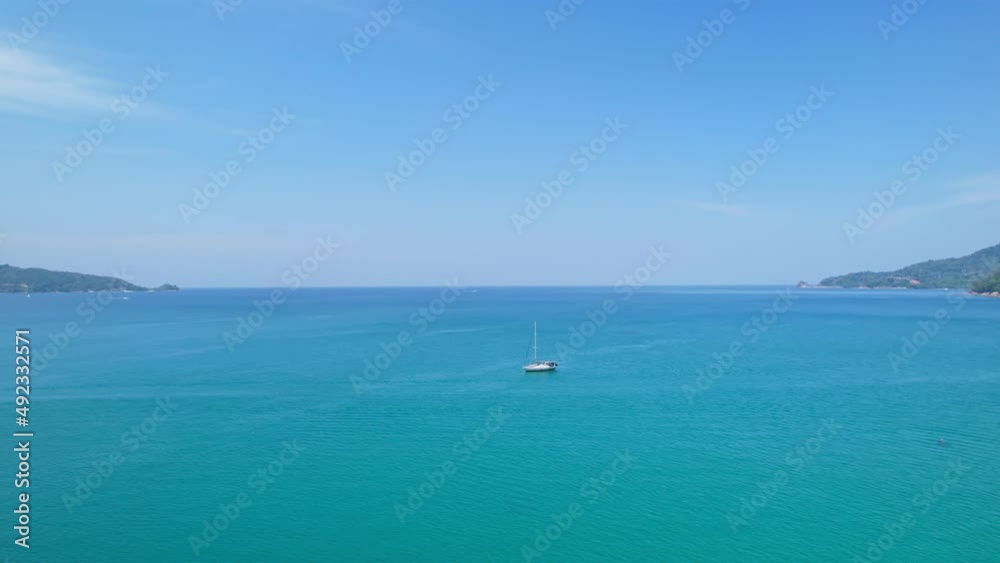 Aerial view beautiful sea beach in summer day. Phuket Thailand Amazing sea with travel boats in the sea. Tourist travel destination in the andaman sea. Beautiful phuket island Aerial view beautiful sea beach in summer day. Phuket Thailand Amazing sea with travel boats in the sea. Tourist travel destination in the andaman sea. Beautiful phuket island