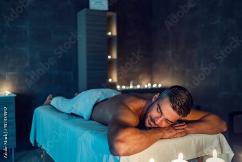A man at massage in spa center.