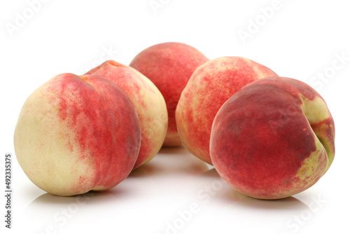 ripe peach on white background