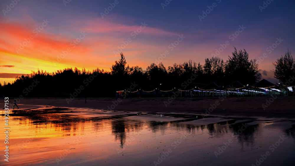 restaurant near Cha Am beach with twilight sky at dusk