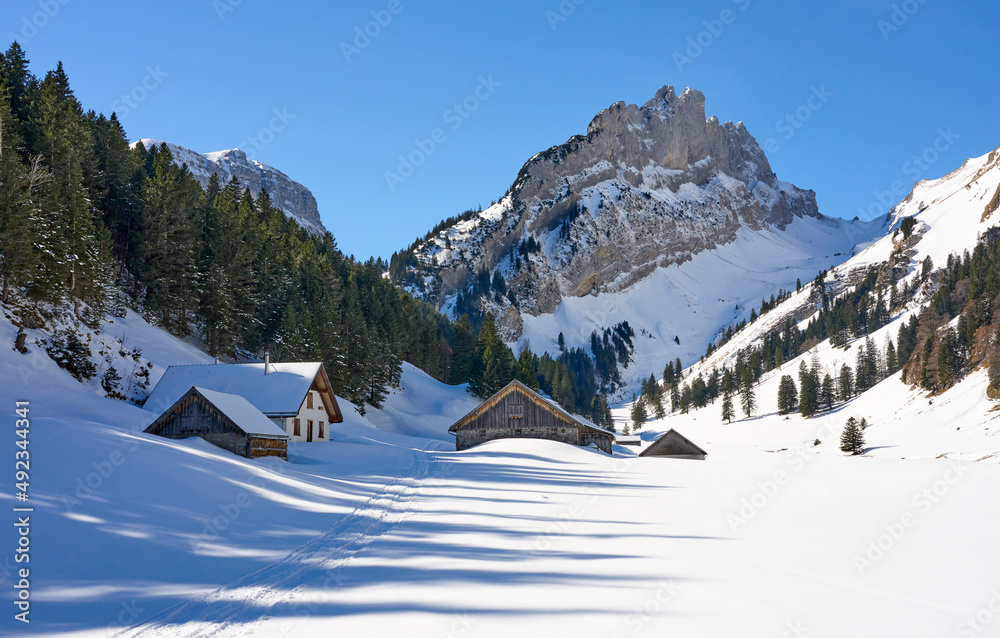 snowy winter landscape in the Alpstein mountain range near Appenzell in Switzerland