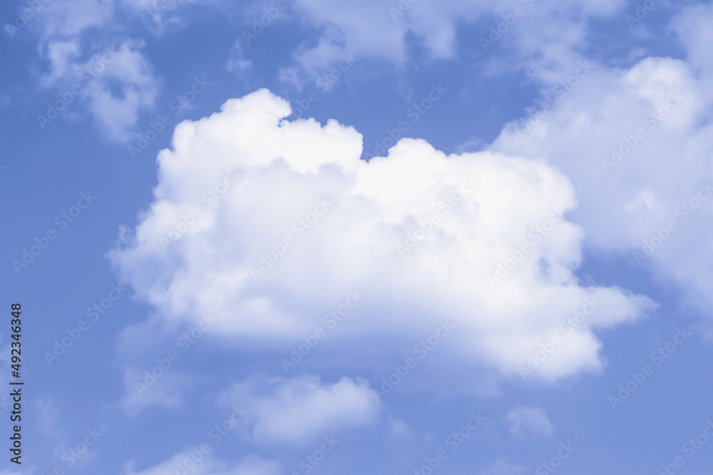 White cloud in blue sky.Beautiful and bright natural background.Color Of The Year 2022 - Very Peri.Soft focus White cloud in blue sky.Beautiful and bright natural background.Color Of The Year 2022 - Very Peri.Soft focus