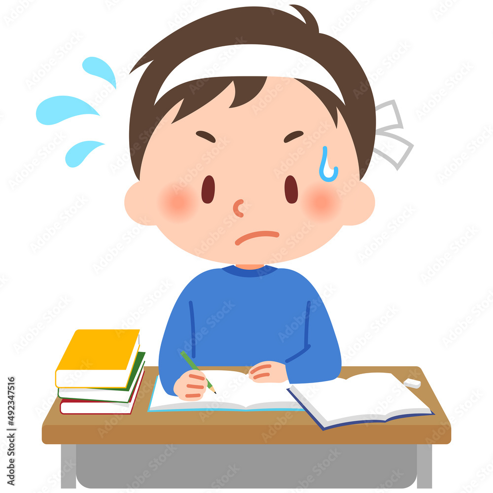 真剣な表情で勉強する小学生 真剣な表情で勉強する小学生
