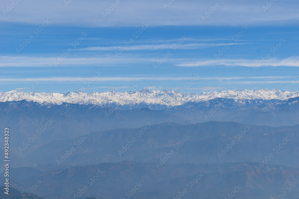 Himachal himalayan peaks telephoto taken from Naina devi temple rewalsar. Kullu district and pin valley peaks