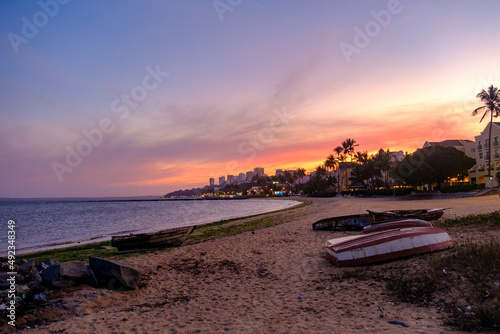 Sun setting on the beach in Maputo, Mozambique © Yann