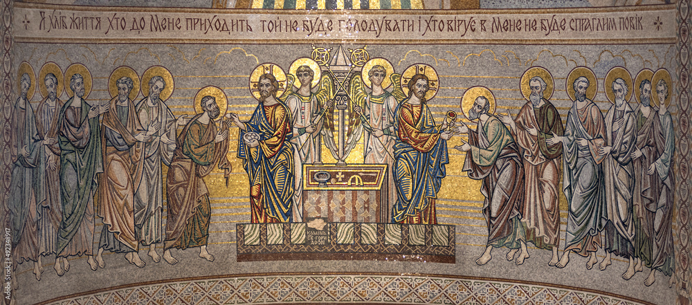 Communion of the Apostles. Mosaic icon on the apse of the church