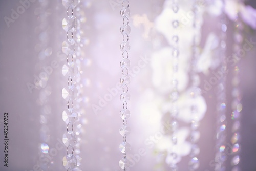 Wedding decor made of white flowers and sparkling beads