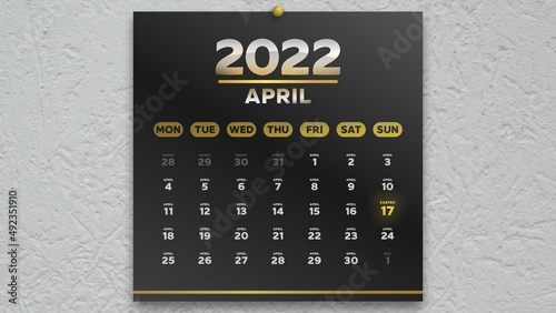 A beautiful black April page of the calendar 2022 and Easter date marked with gold