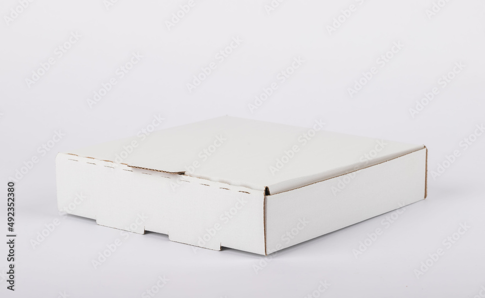 Naklejka premium pizza box standing on a white background