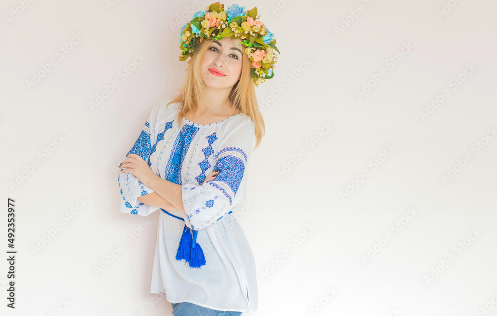 Ukrainian fashionable woman in embroidery traditional shirt. Concept of brave Ukraine and people of that country Ukrainian fashionable woman in embroidery traditional shirt. Concept of brave Ukraine and people of that country