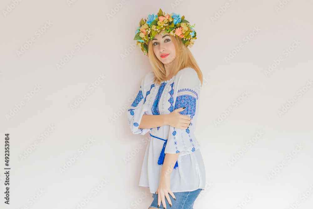 Ukrainian fashionable woman in embroidery traditional shirt. Concept of brave Ukraine and people of that country Ukrainian fashionable woman in embroidery traditional shirt. Concept of brave Ukraine and people of that country