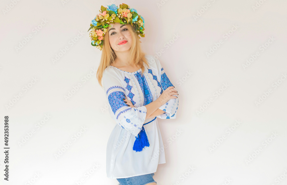 Ukrainian fashionable woman in embroidery traditional shirt. Concept of brave Ukraine and people of that country Ukrainian fashionable woman in embroidery traditional shirt. Concept of brave Ukraine and people of that country